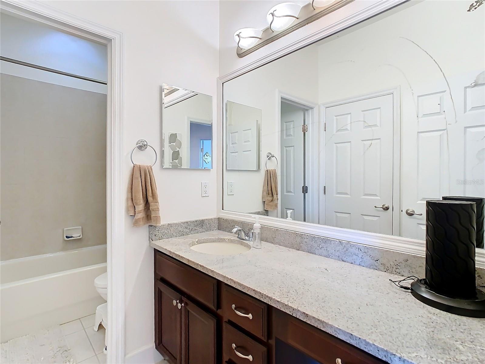 2nd bathroom on the top floor that has a tub