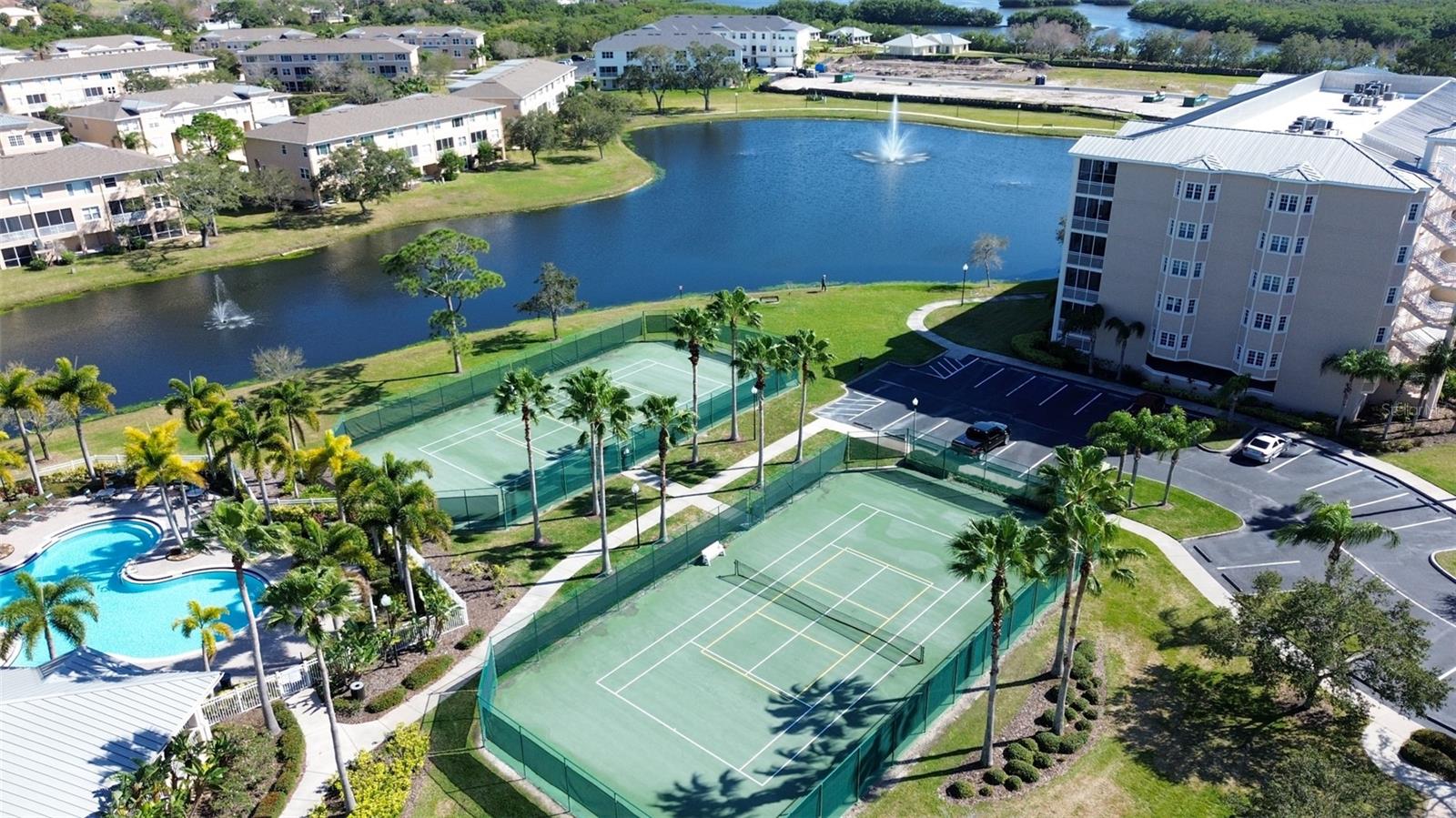 Nice aerial view of the tennis courts and pool area