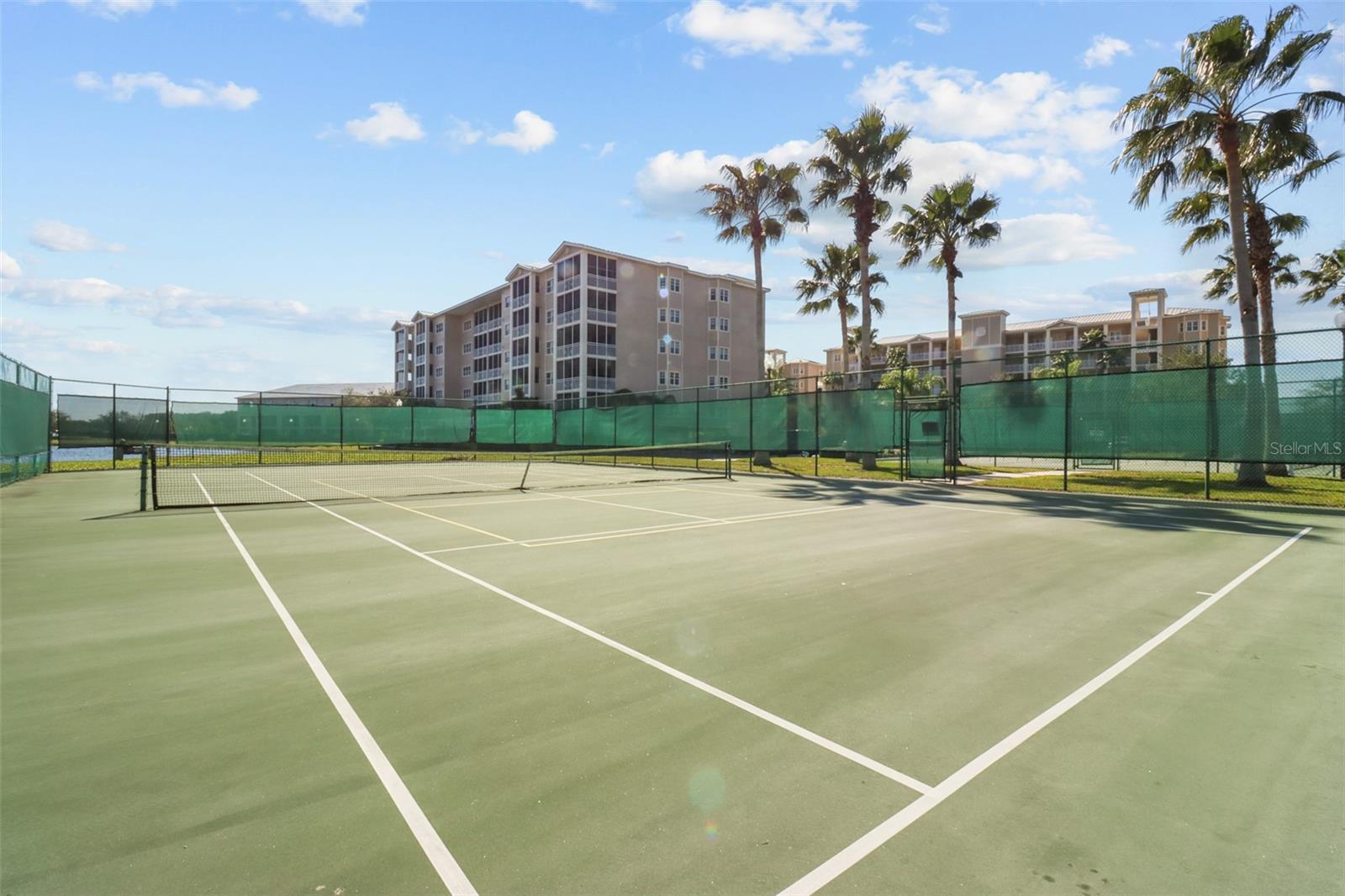 This community has tennis/pickle courts right behind the clubhouse