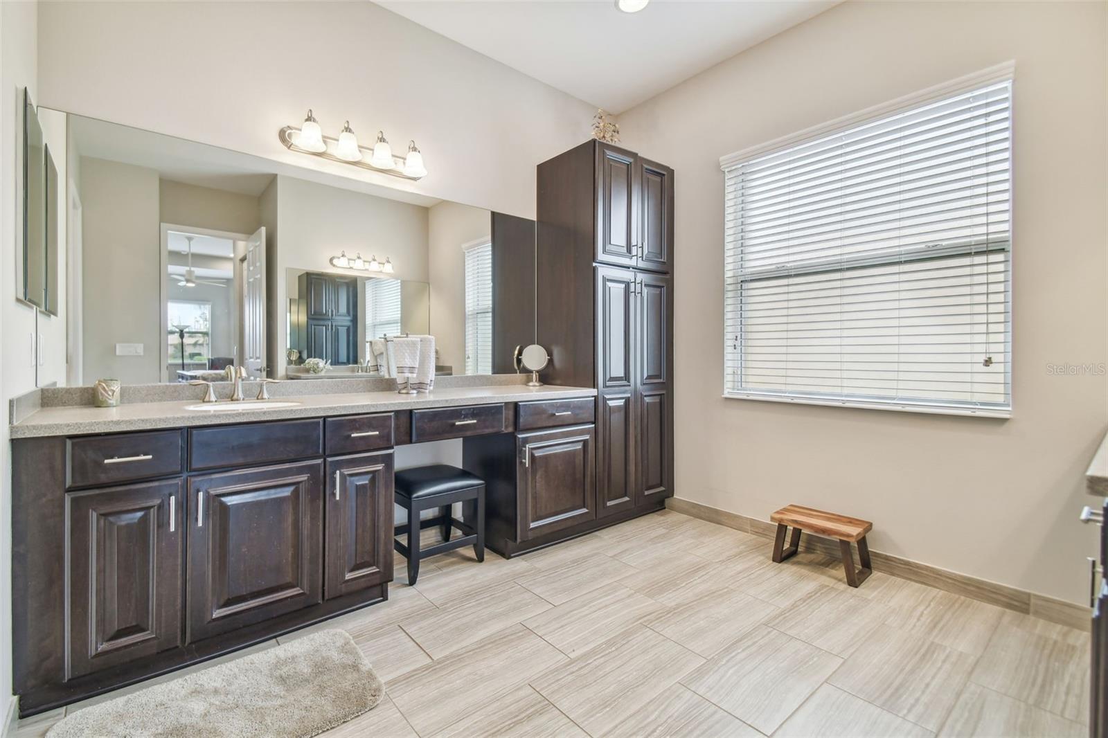 Primary Ensuite bathroom with double vanities