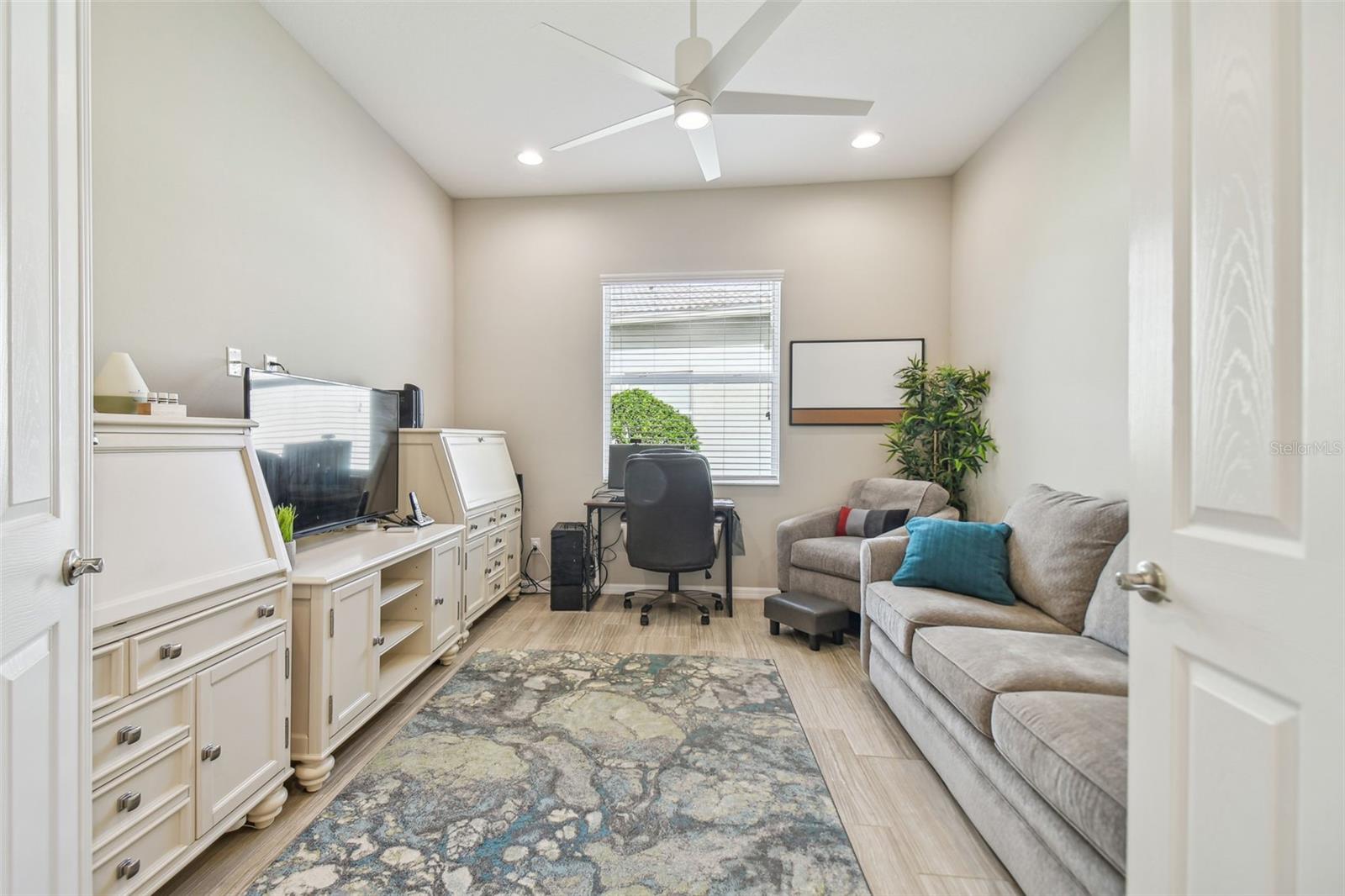 French doors leading into den/home office or 4th bedroom