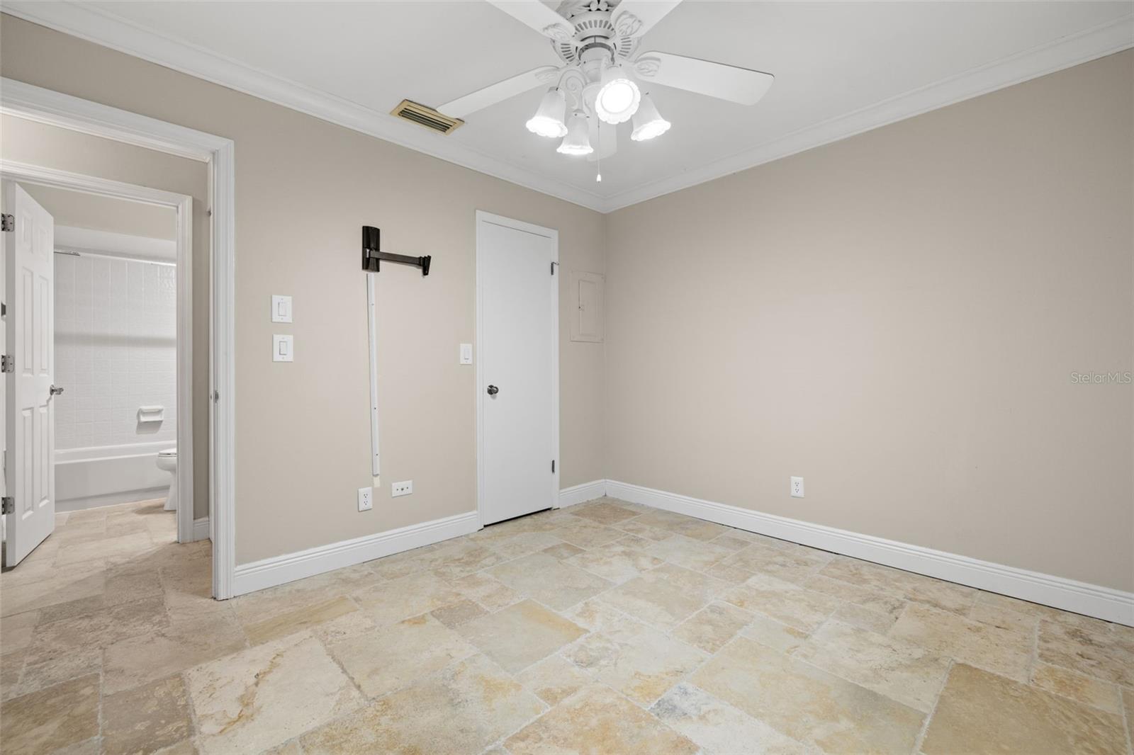 Guest bedroom is right next to the guest bathroom and the washer and dryer