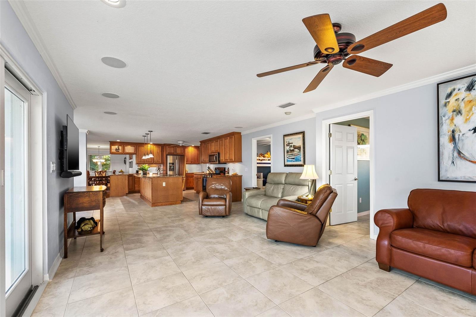 Oversized living area looking towards kitchen photo from March 2024