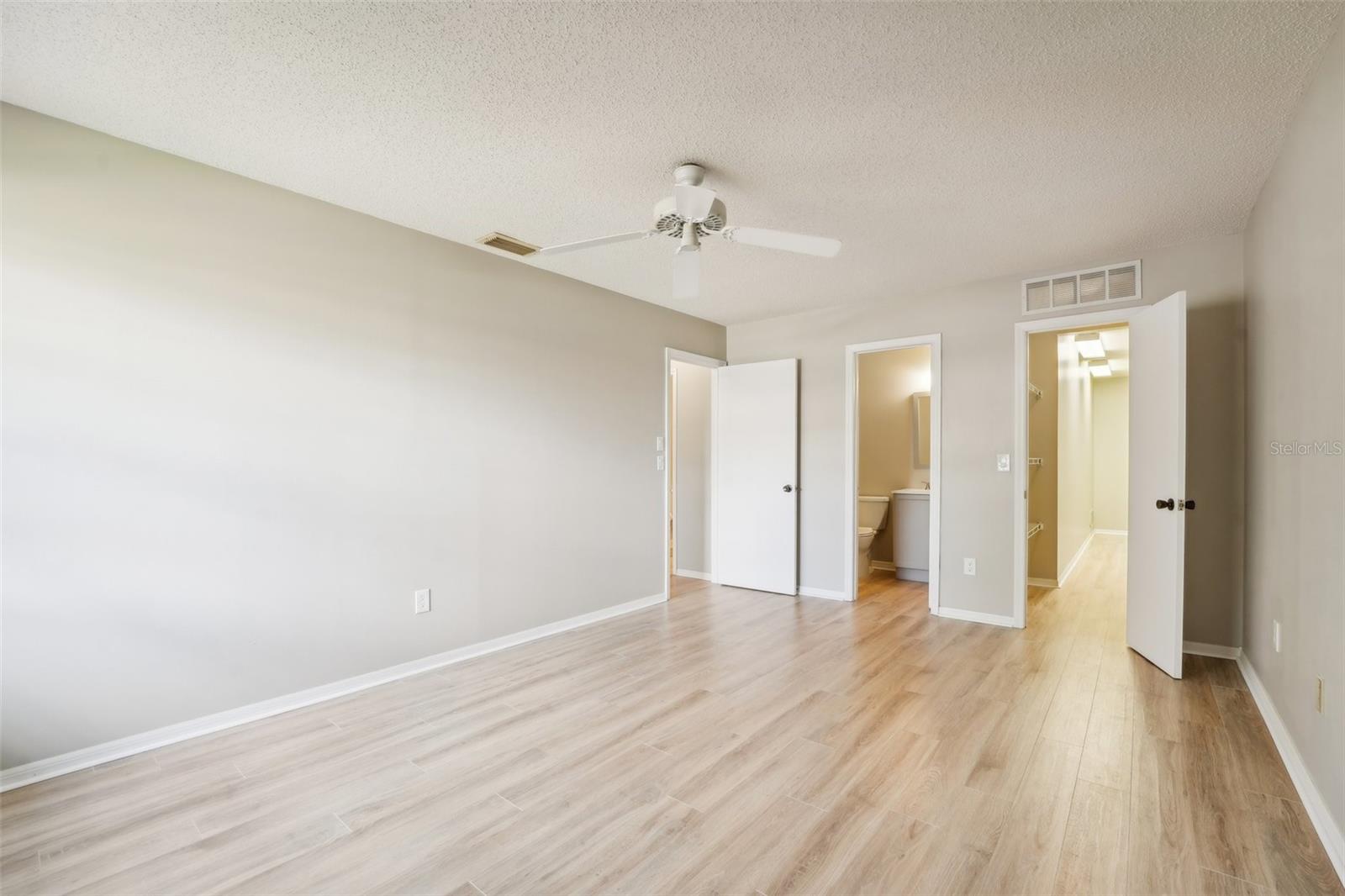 MASTER BEDROOM-FRESHLY PAINTED AND NEW FLOORS THROUGHOUT