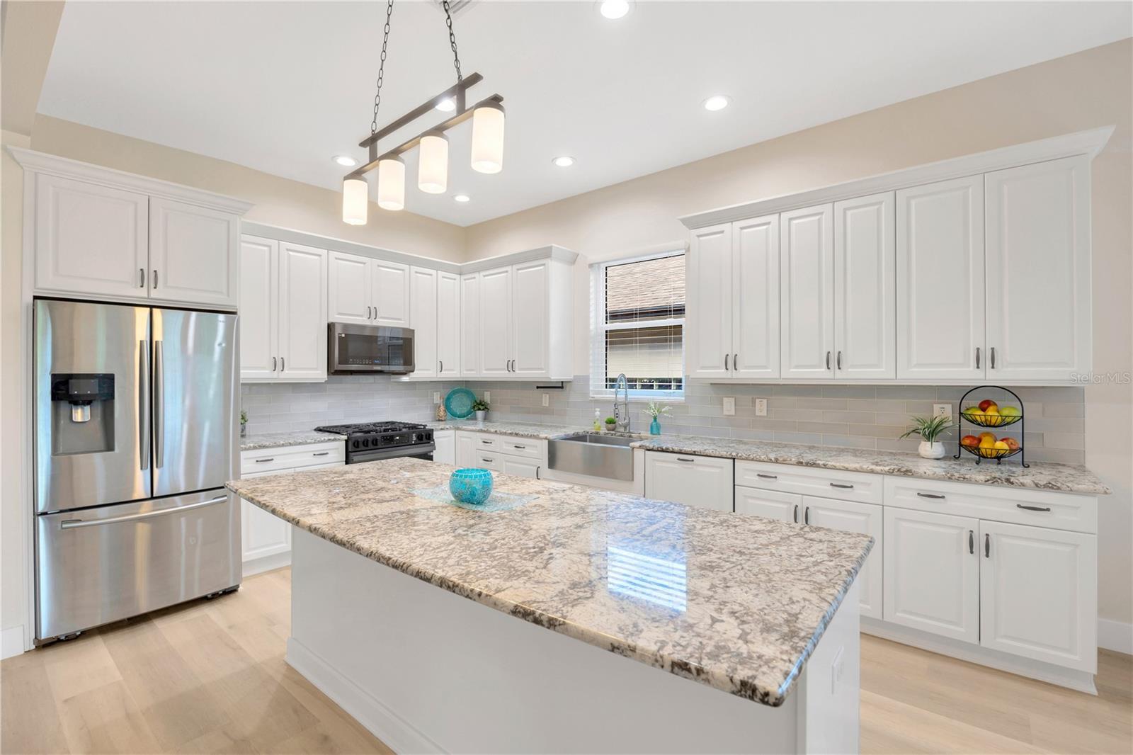 Fully Upgraded Kitchen with Stainless Steel Appliances, gas range, granite countertops, and an abundance of storage!