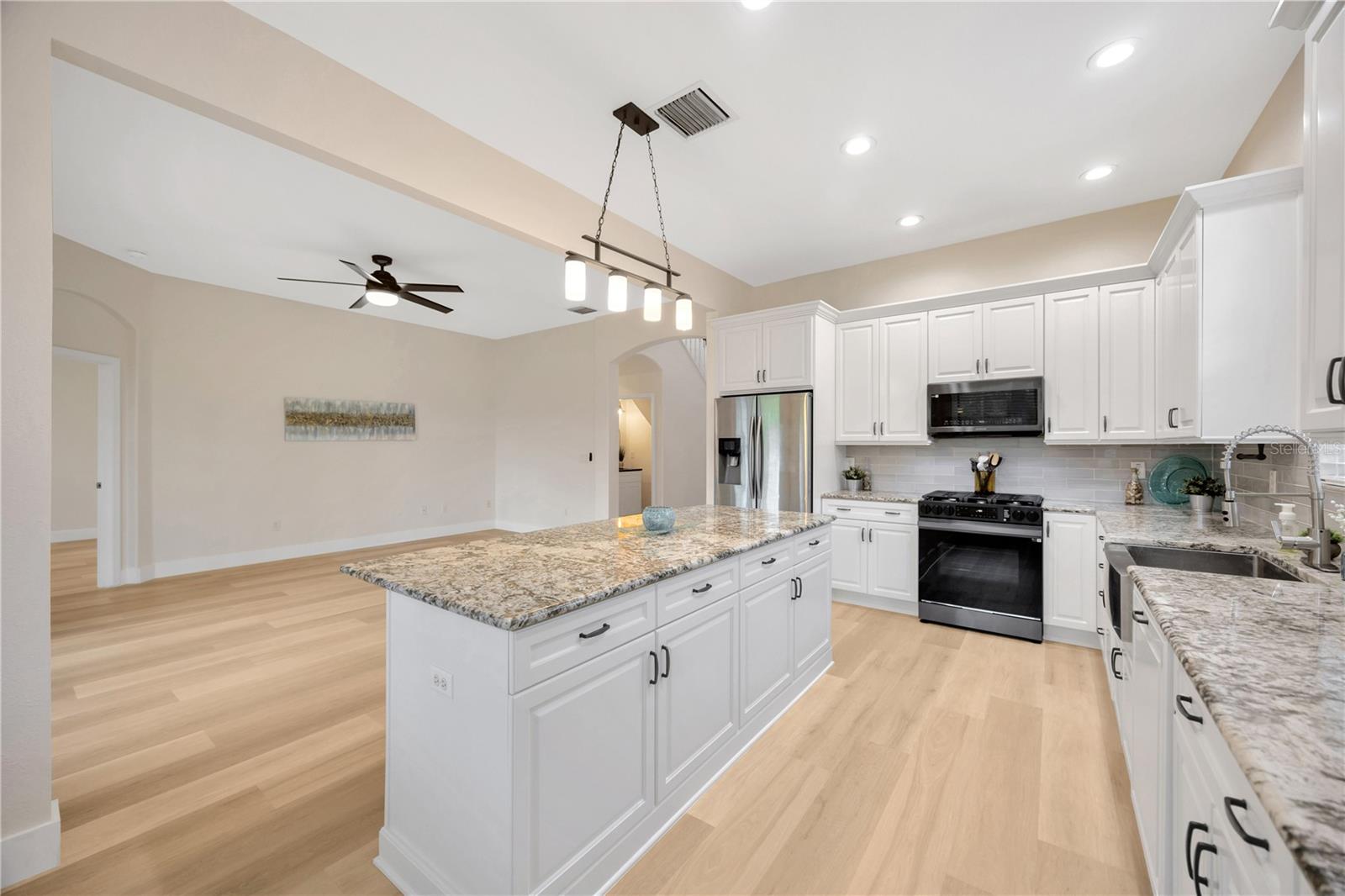 Fully Upgraded Kitchen with Stainless Steel Appliances, gas range, granite countertops, and an abundance of storage!