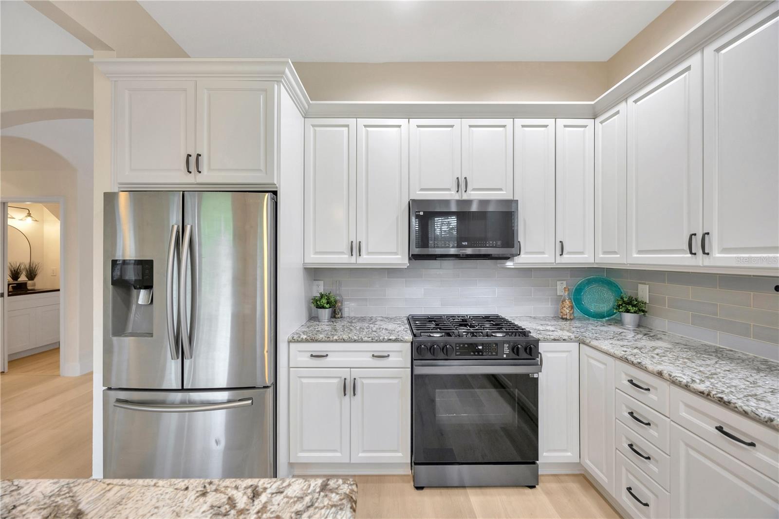 Fully Upgraded Kitchen with Stainless Steel Appliances, gas range, granite countertops, and an abundance of storage!