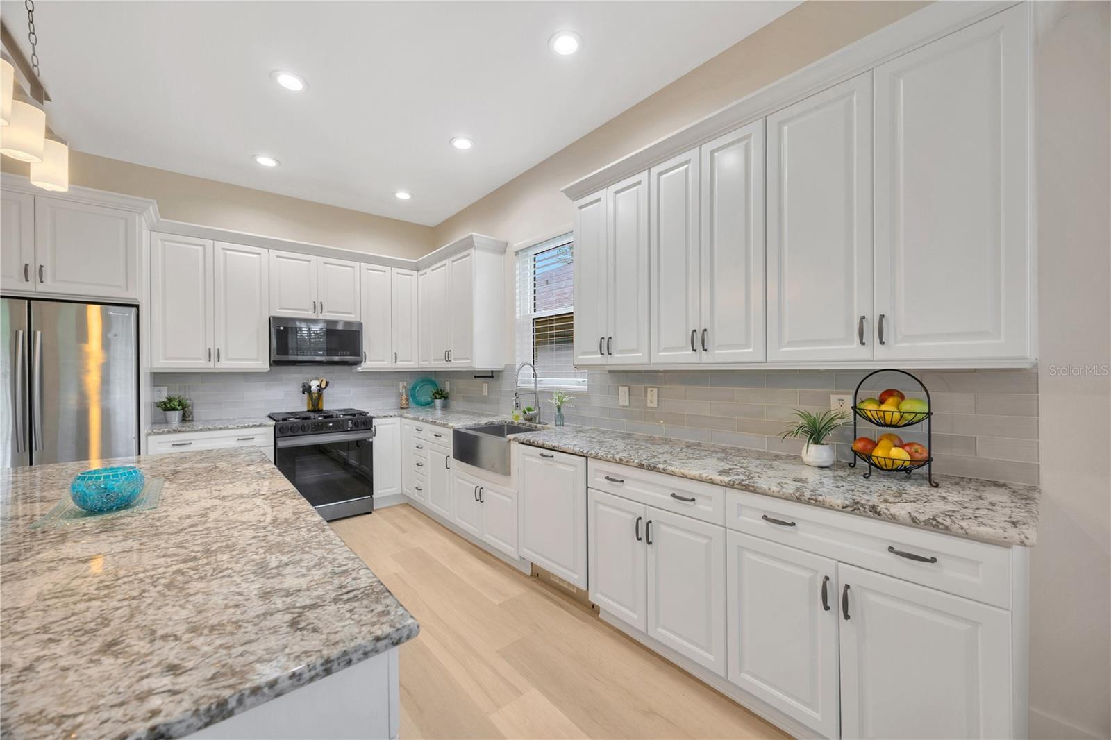 Fully Upgraded Kitchen with Stainless Steel Appliances, gas range, granite countertops, and an abundance of storage!