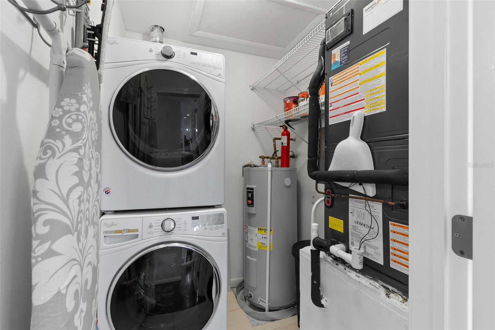 Laundry room with full size washer and dryer included