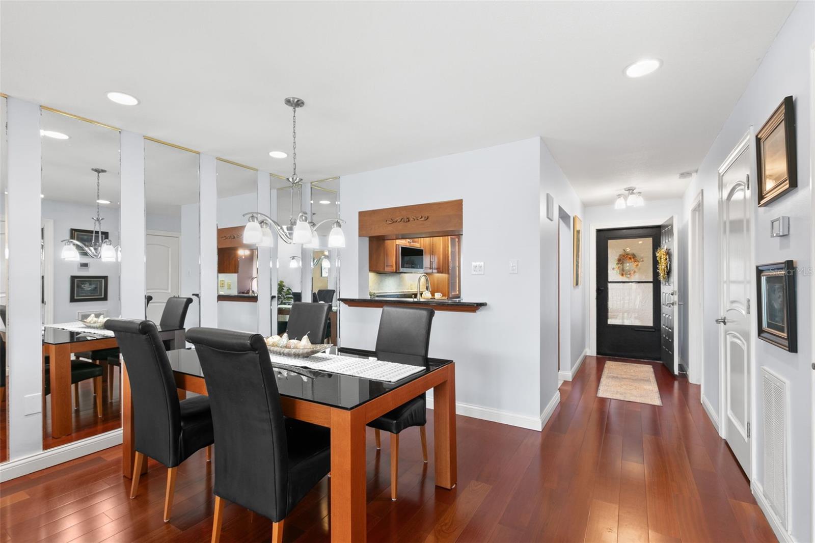 Dining Room with pass through breakfast bar into kitchen