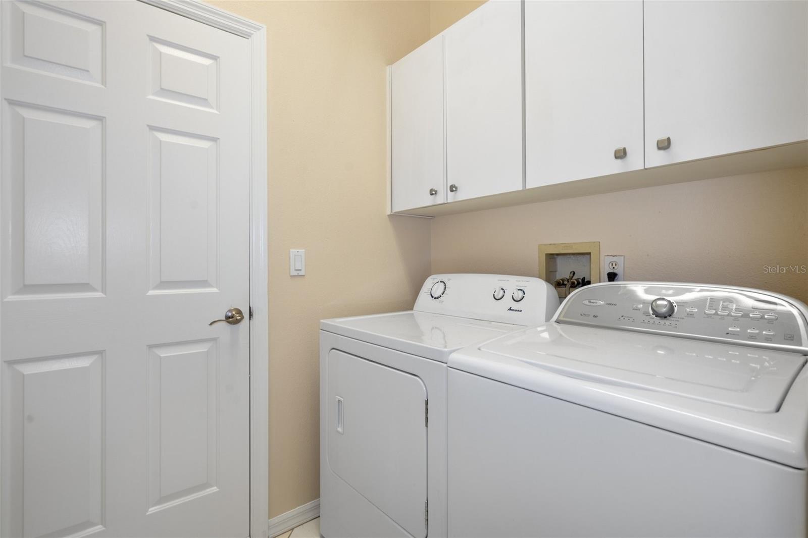 laundry room and upper cabinets