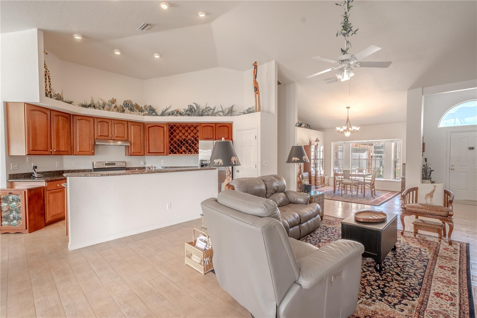 The kitchen is adjacent to the living room.