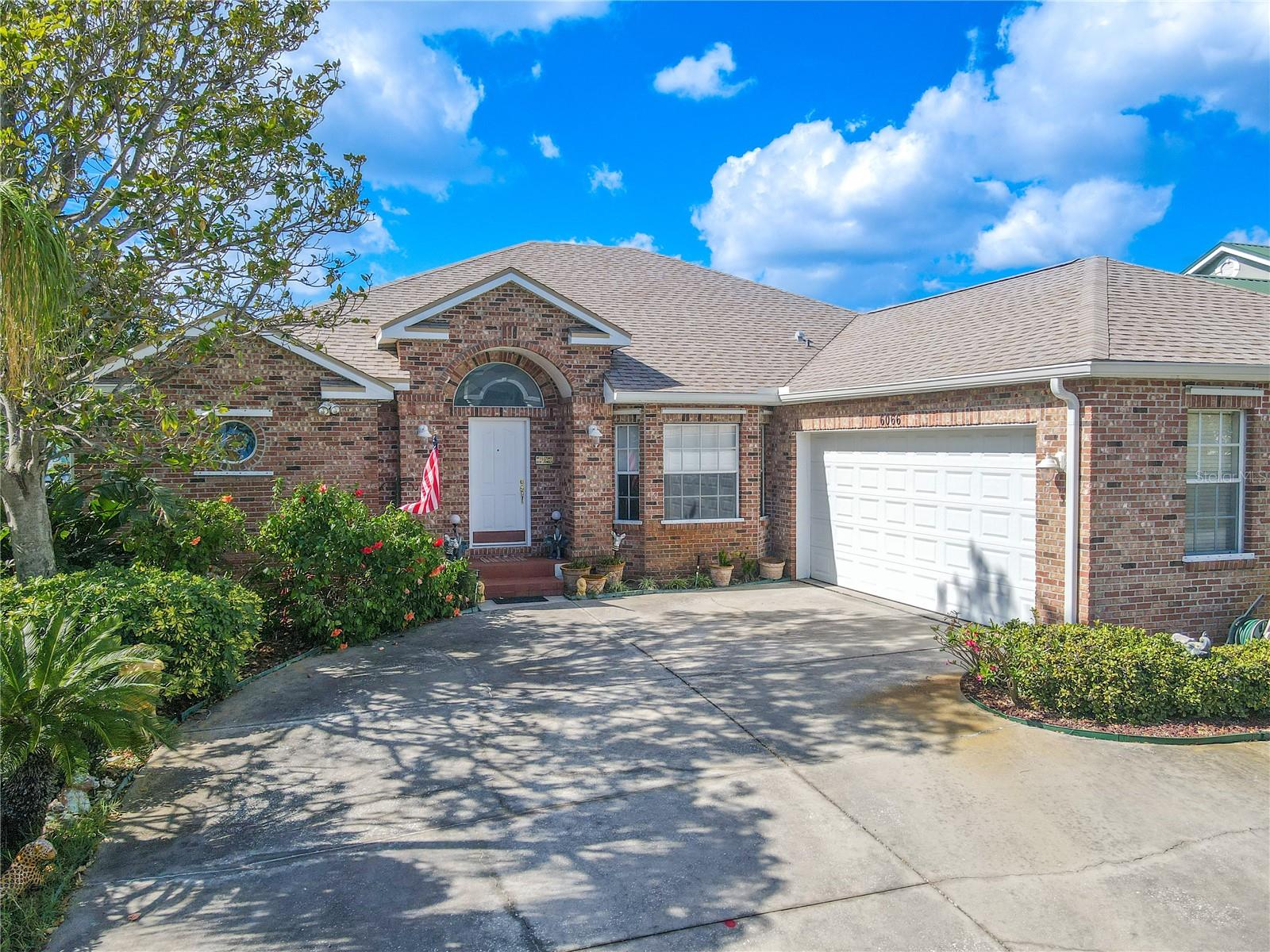 The home features neutral tones, and an foyer that has a convenient coat closet upon entry.