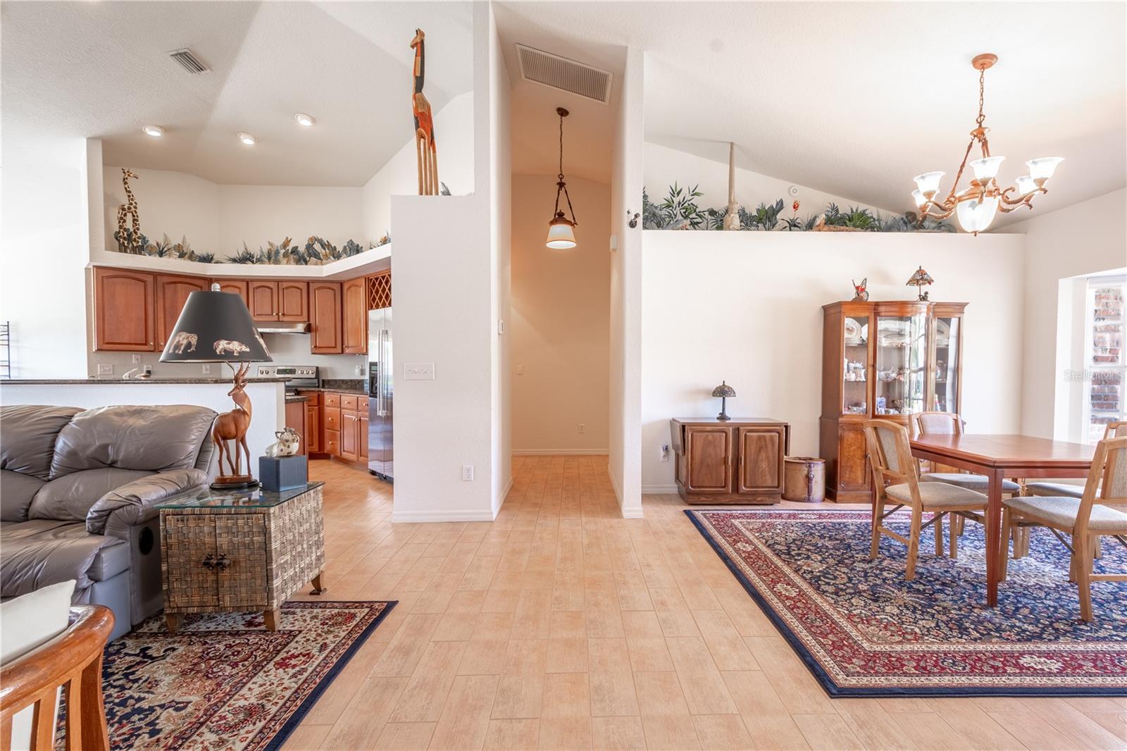 The home has high ceiling and an open floor plan.