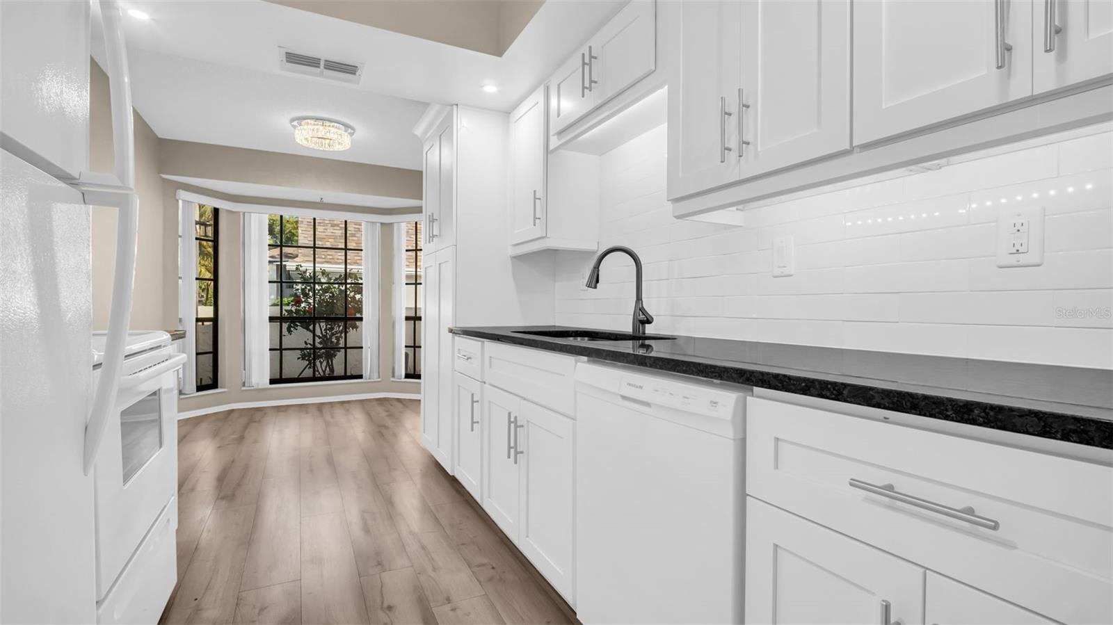 coming into kitchen from garage lots of counter space