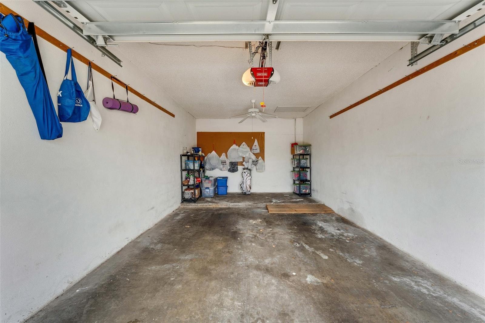 Oversized garage located just steps away from entrance & large enough for both a car & golf cart too~