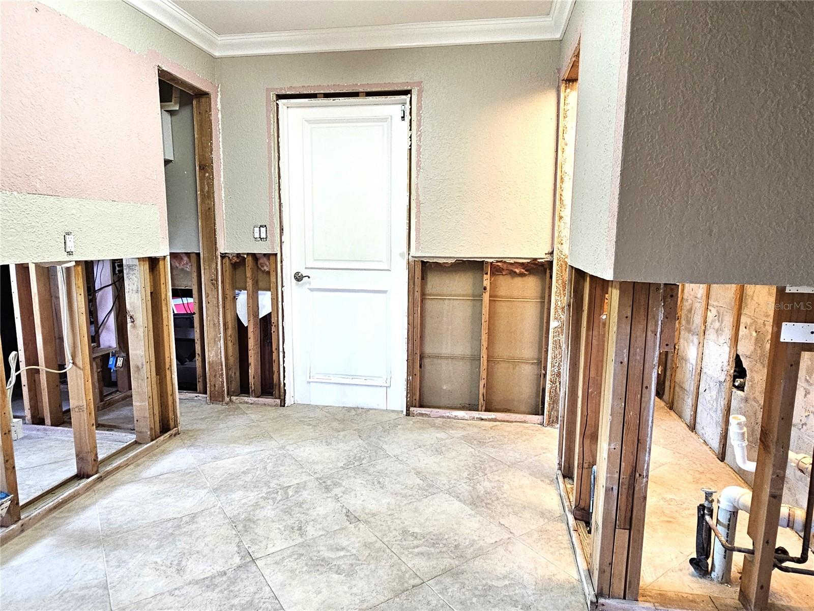 Laundry Room with Half Bath & entrance to the Garage!