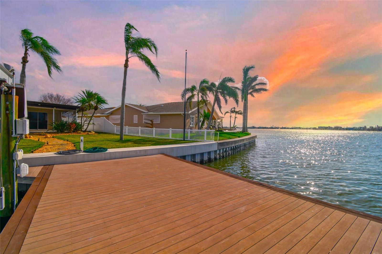 Calling all Boaters!!! This home is 2nd from the end of a finger on Boca Ciega Bay!!!