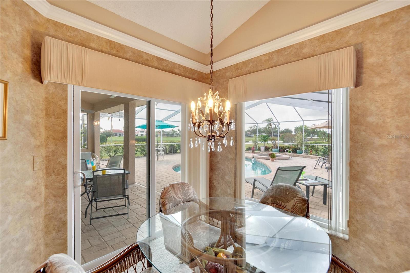 This home is built all around the view.  Pool, pond, and golf course views are abundant.