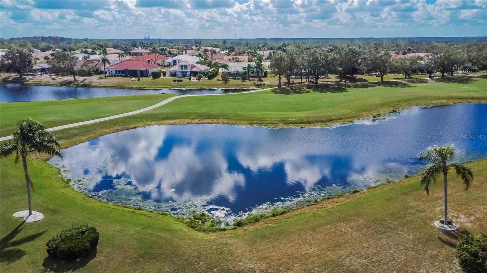 The home really has tremendous amount of privacy.  Beautiful pond views with a golf course behind. Course plays to the right.