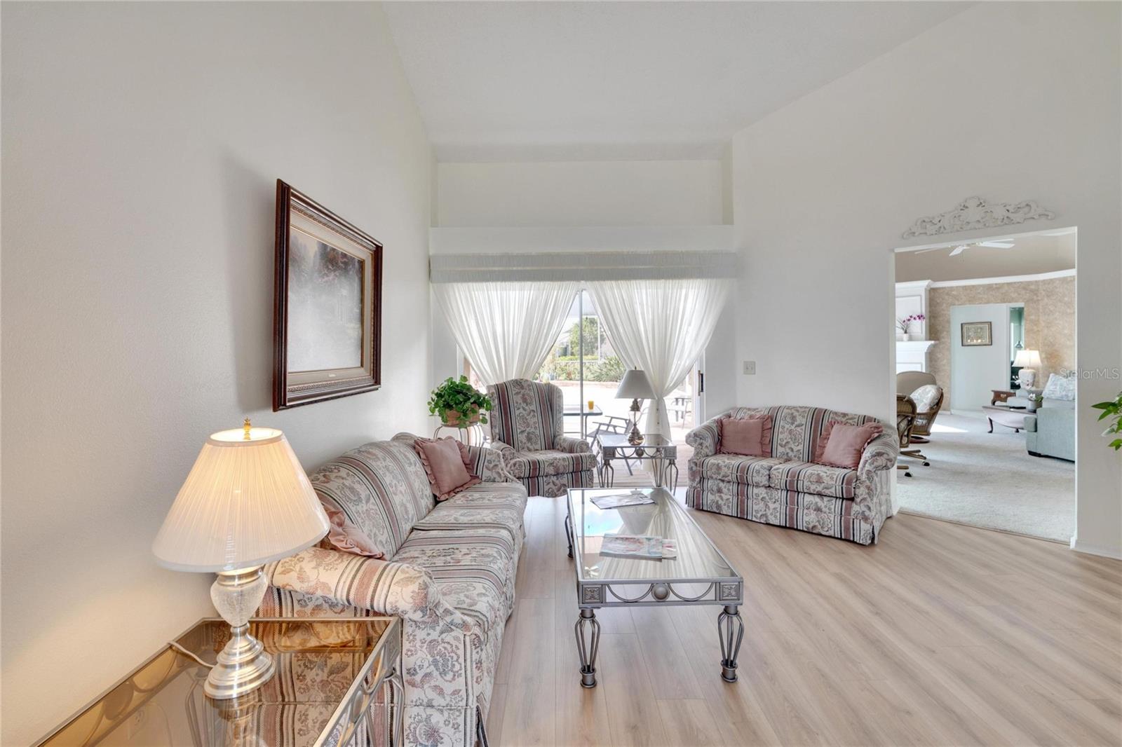 Large open, split floor plan with cathedral ceilings.  Bedroom one is to the left at the front of the home.  Bedrooms two and three are adjacent to the family room.