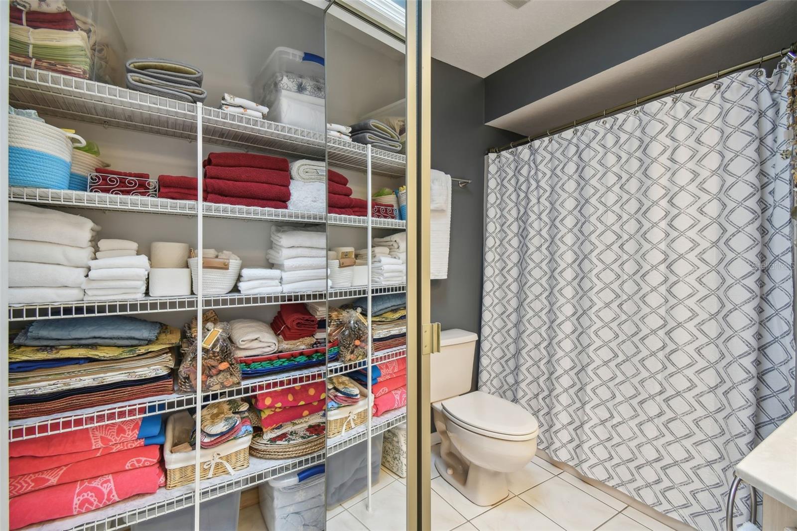 2nd full bathroom with large linen closet