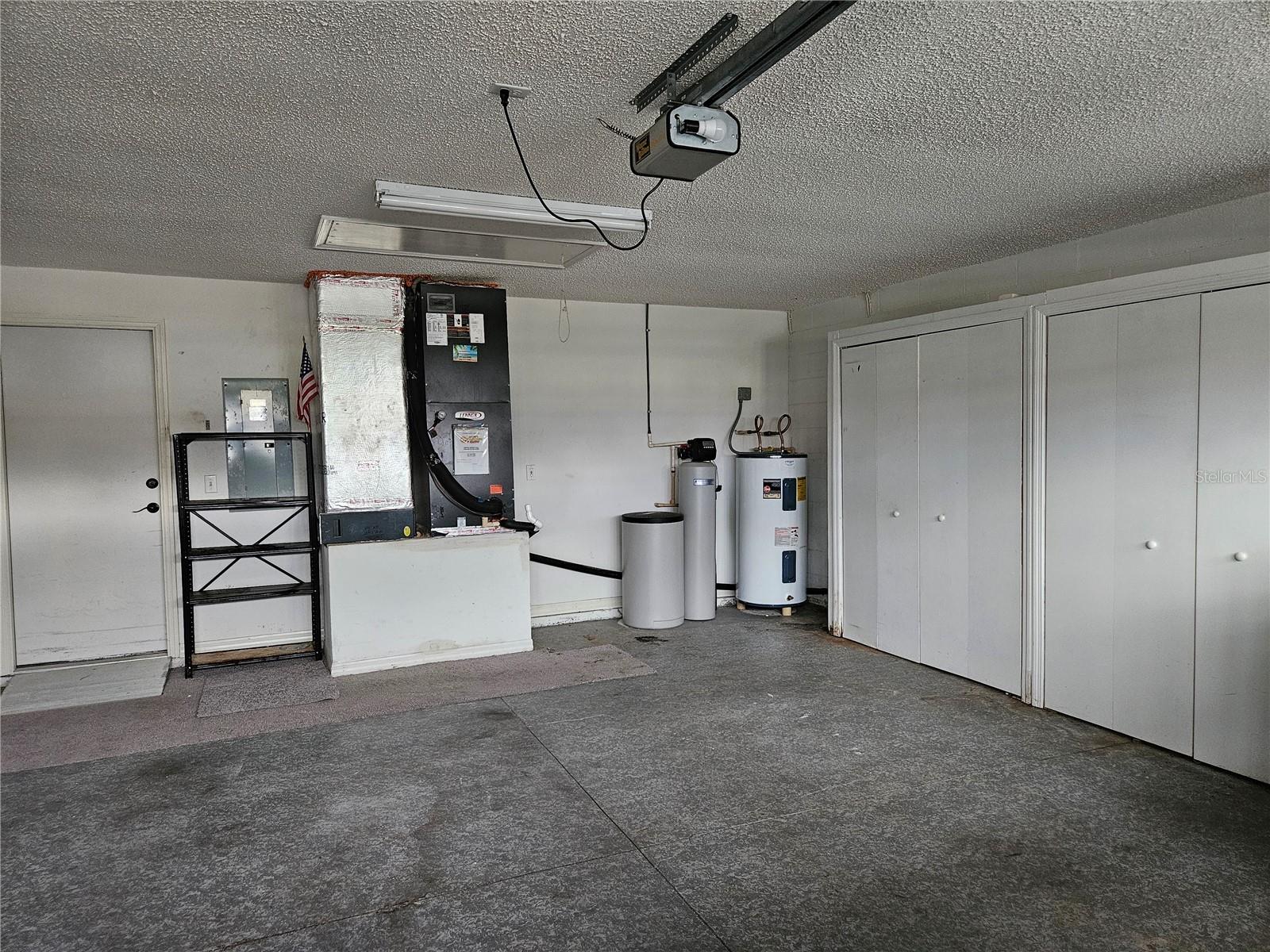 Lots of storage cabinets in garage