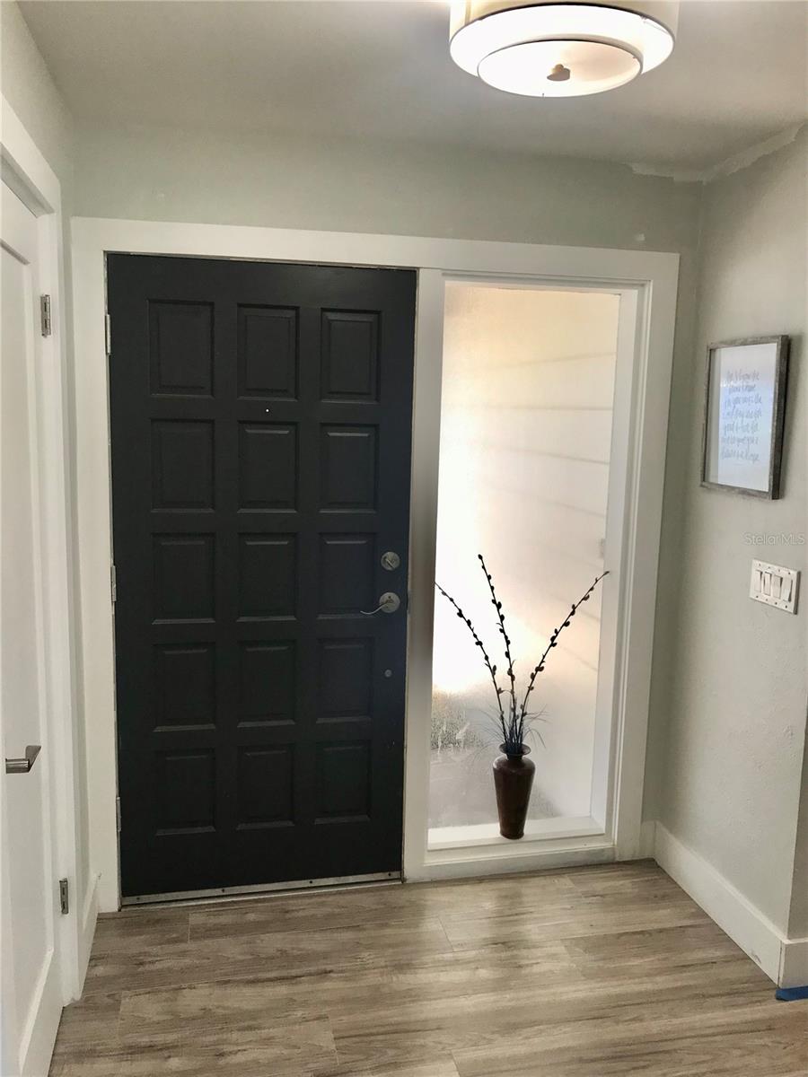 Welcoming foyer with a large entry closet.