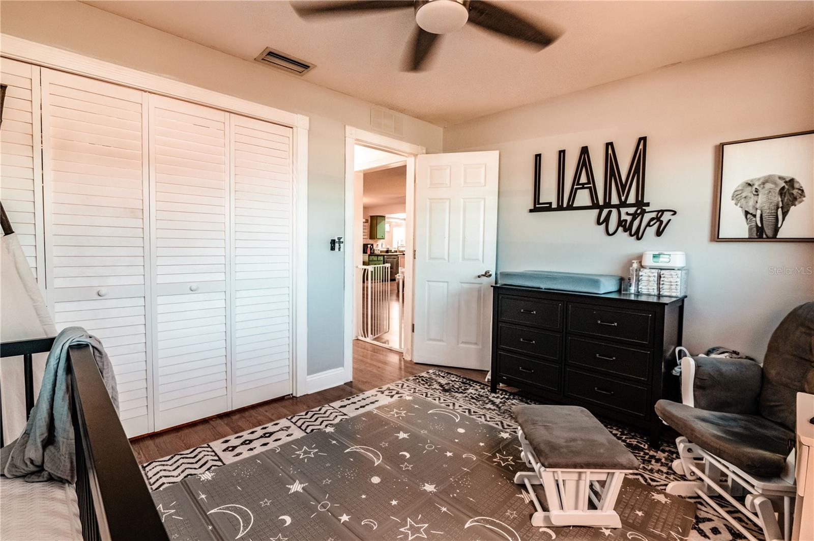 The opposite view of the 10X12 nursery shows the large closet and close vicinity to the living room and hallway.