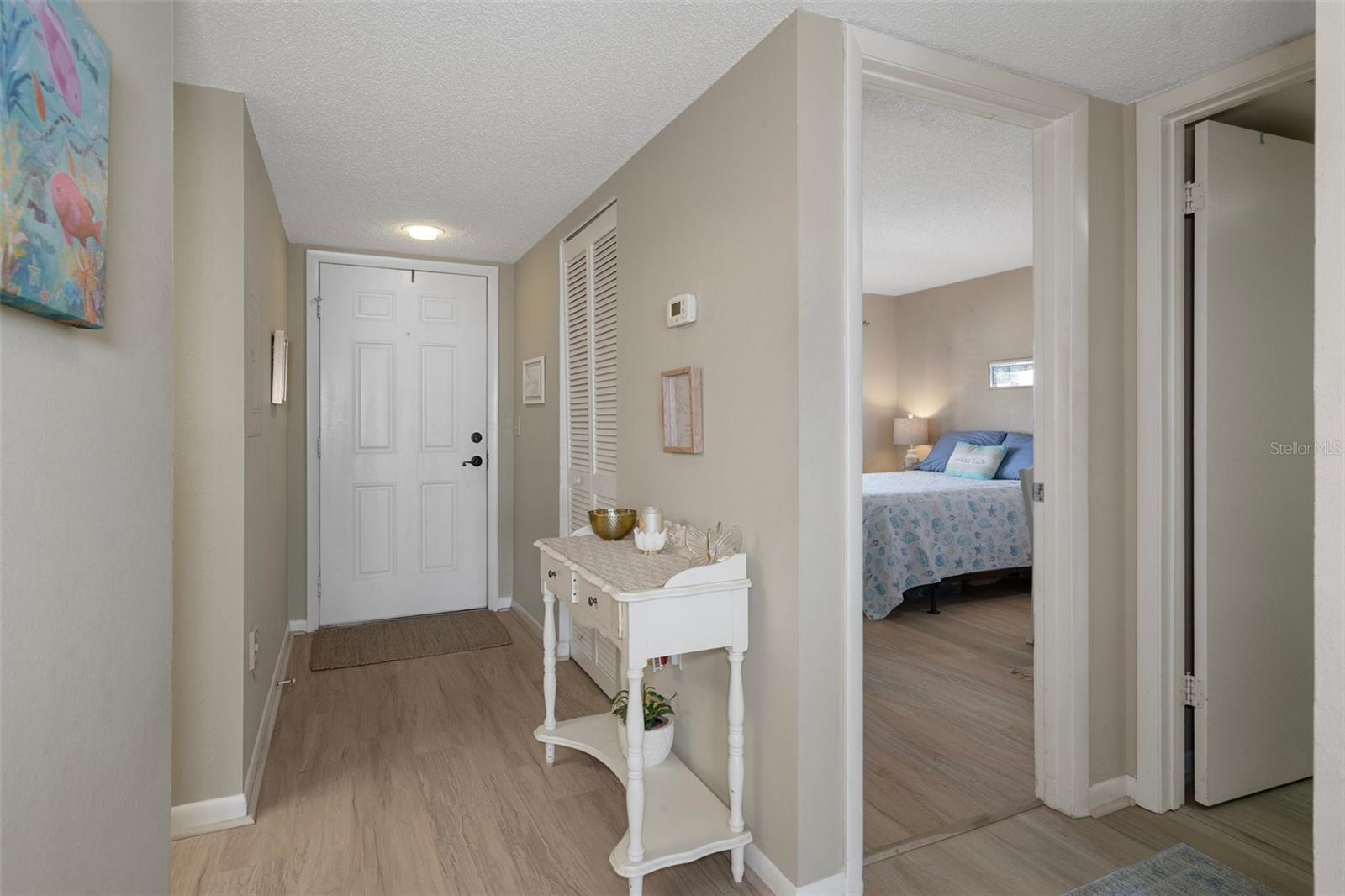 Foyer and guest bedroom