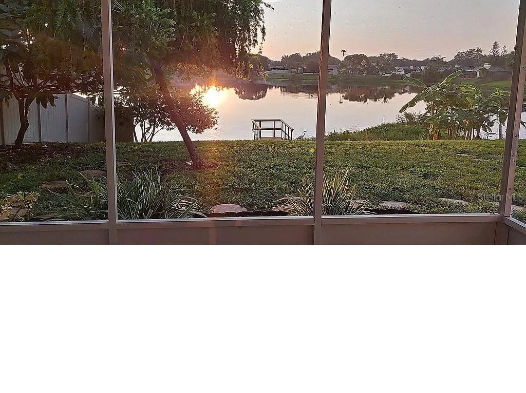 Screened in patio overlooking lake