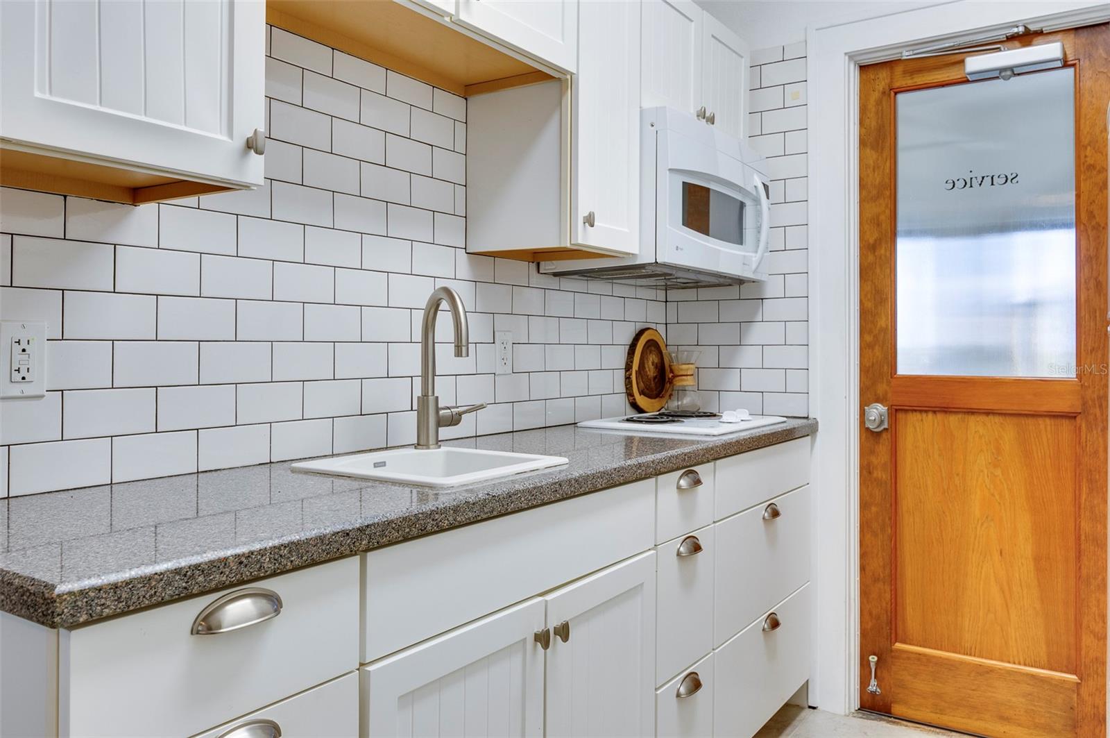 Plenty of counter space and a nice backsplash