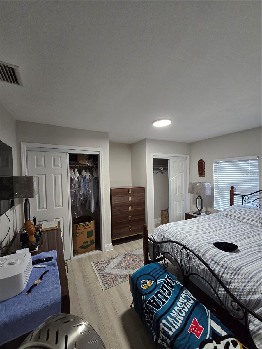 Master Bedroom with His and Her Closet