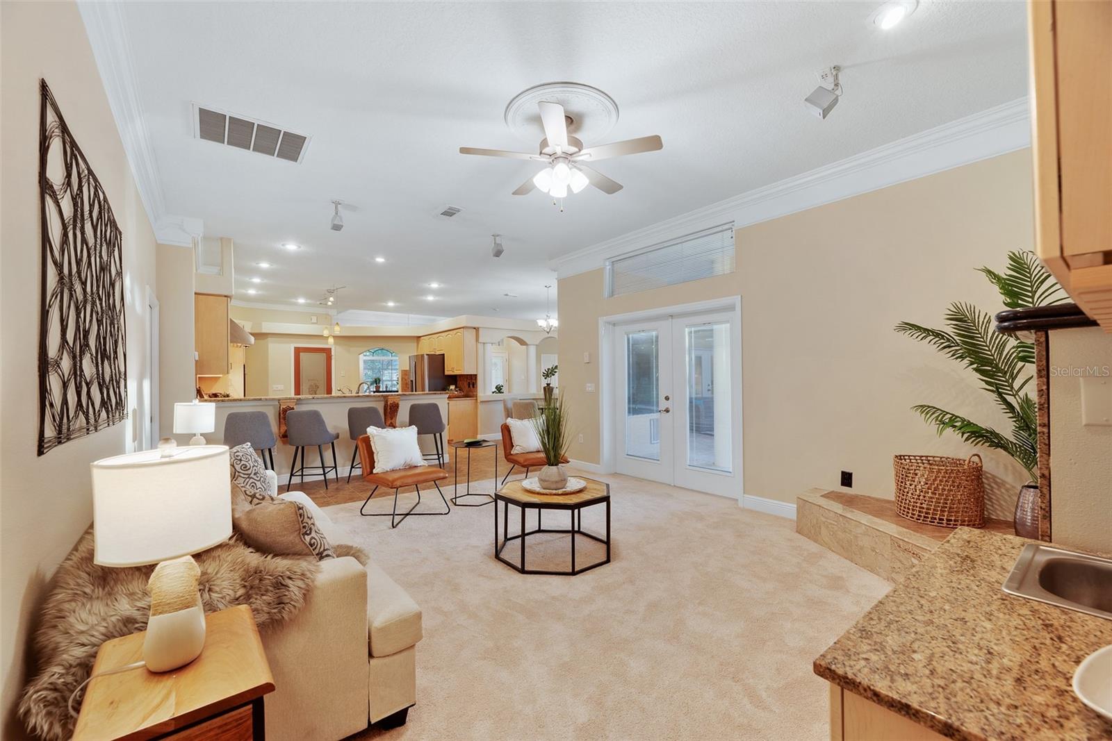 The open floor plan between the kitchen and family room makes entertaining effortless.