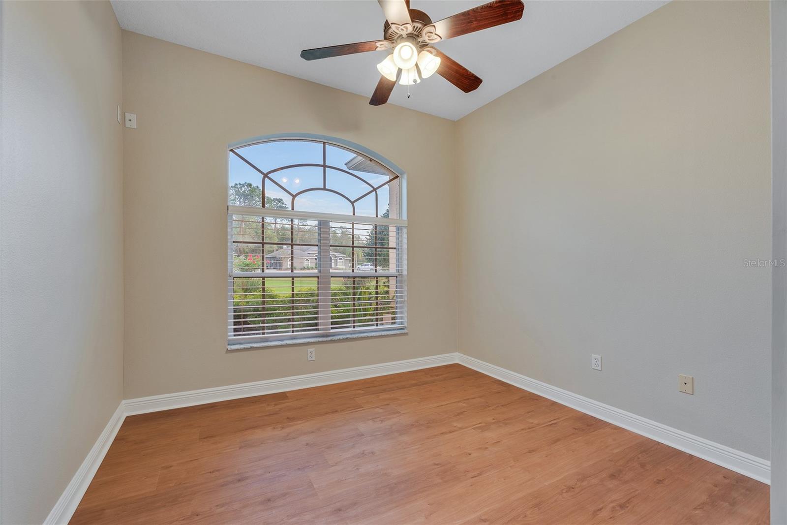 An additional office next to the Owner's suite at the front of the home has double doors to focus your workday.