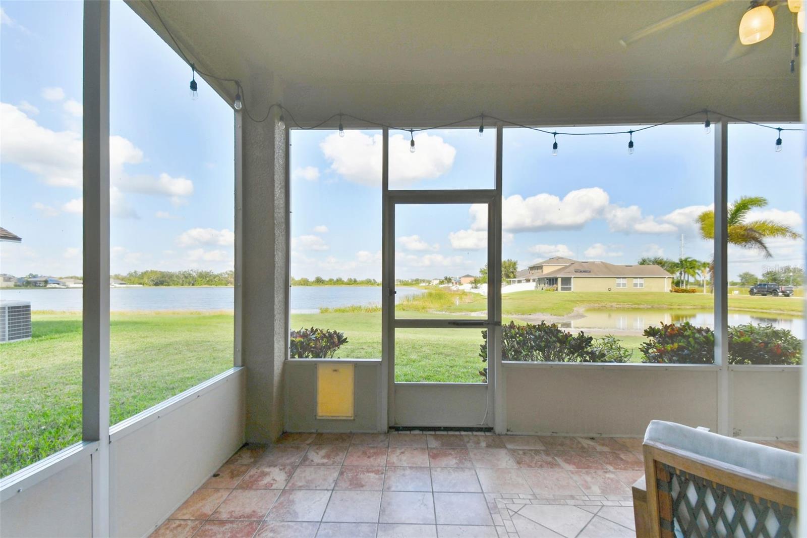 Backed screened in lanai off family room facing the water