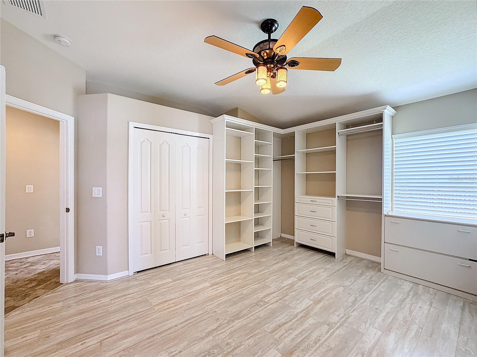 Second bedroom is adjoined to the owner suite to create a massive walk-in closet. Can be converted back to separate bedroom easily.