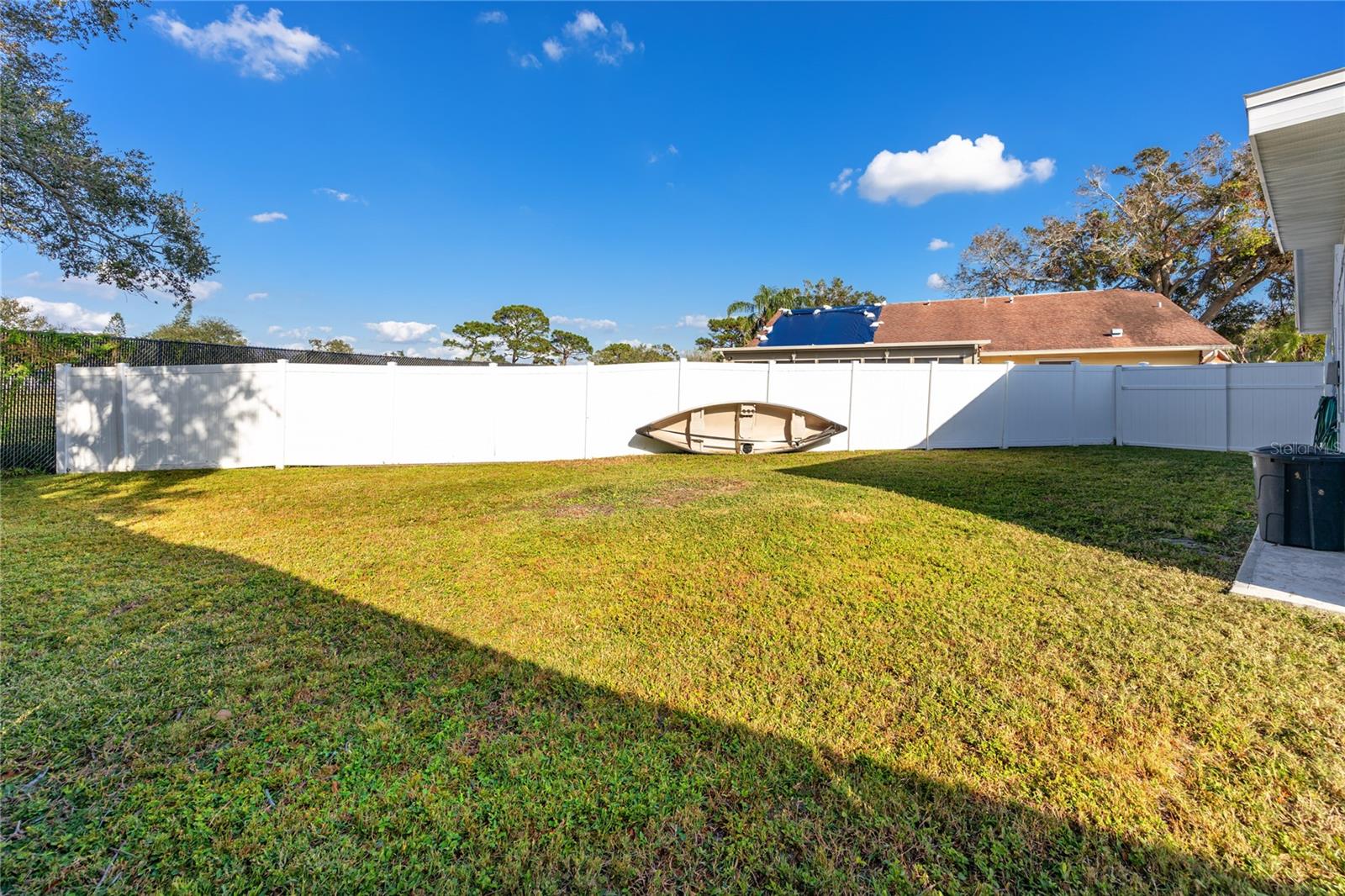 Large fenced in backyard to enjoy the Florida sun!