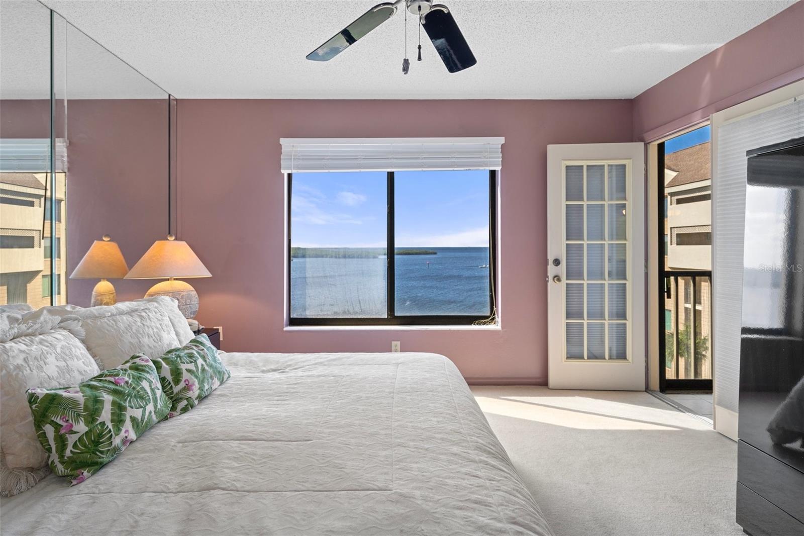 Master suite with waterfront view