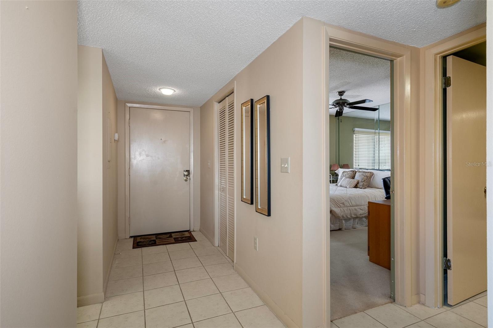 Foyer and guest bedroom