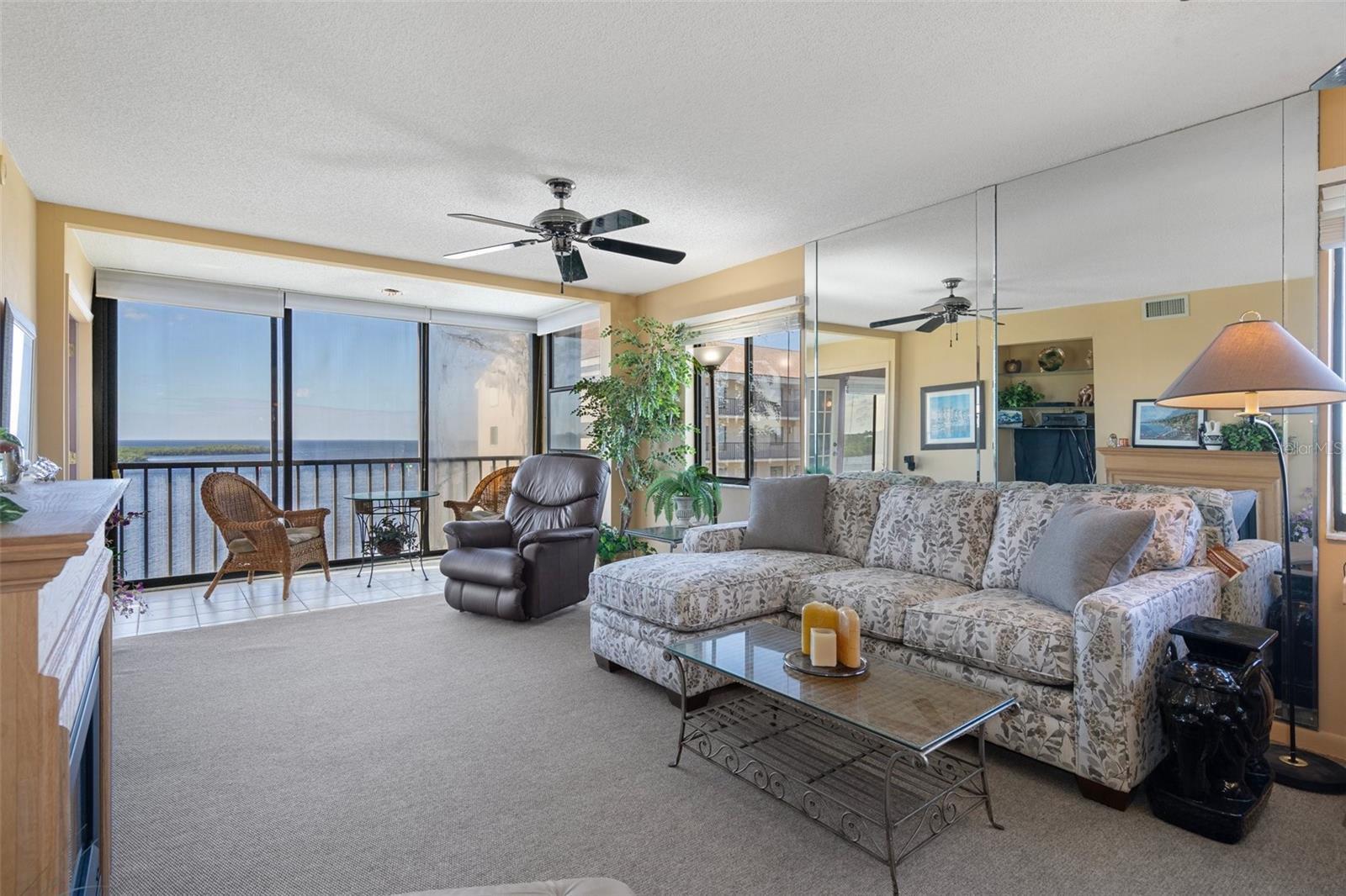 Living room area with waterfront view