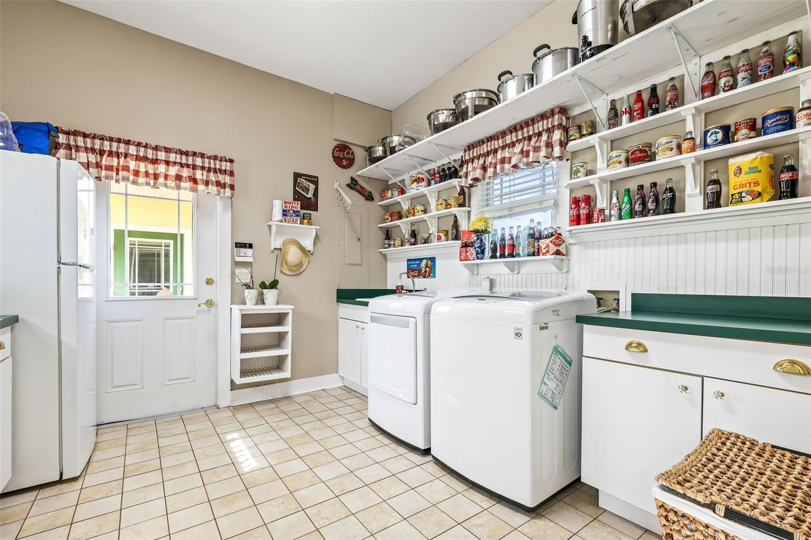 Laundry Room off of Kitchen and Access to Detached Garage