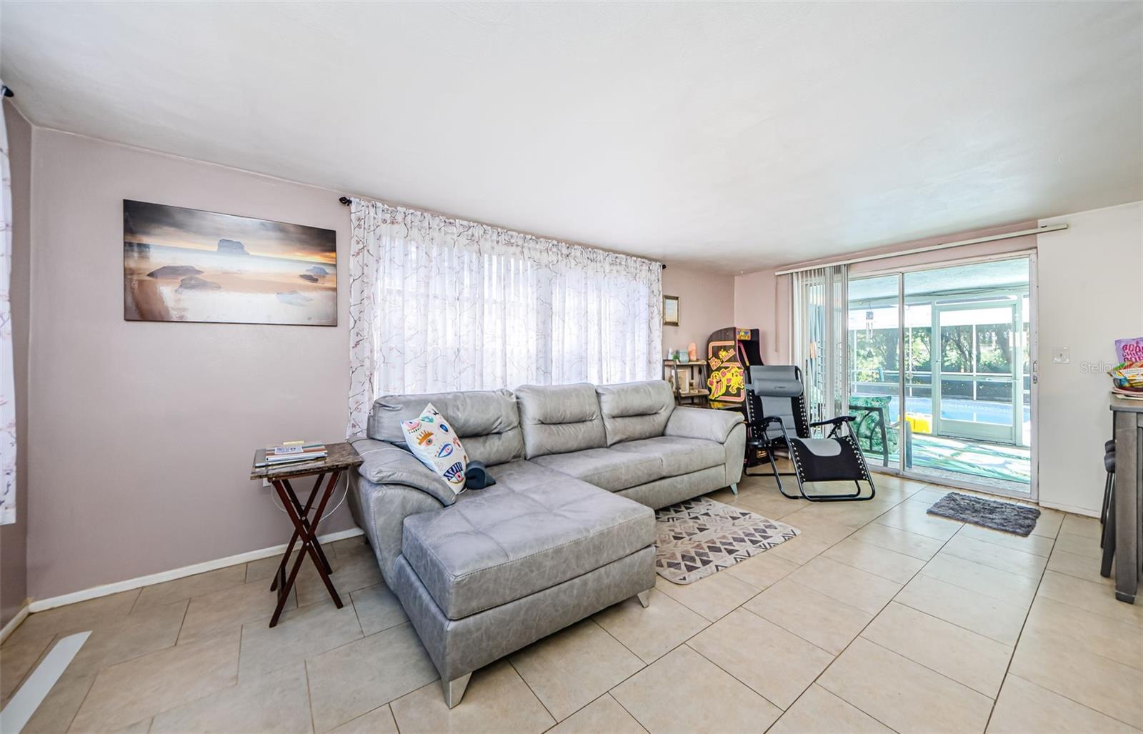 Family room with patio access to pool