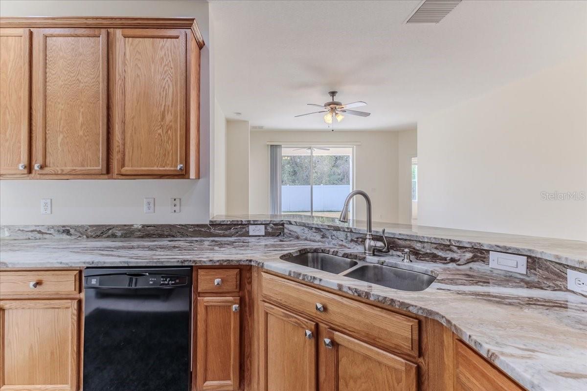 Kitchen with Breakfast Bar & GRANITE Counters