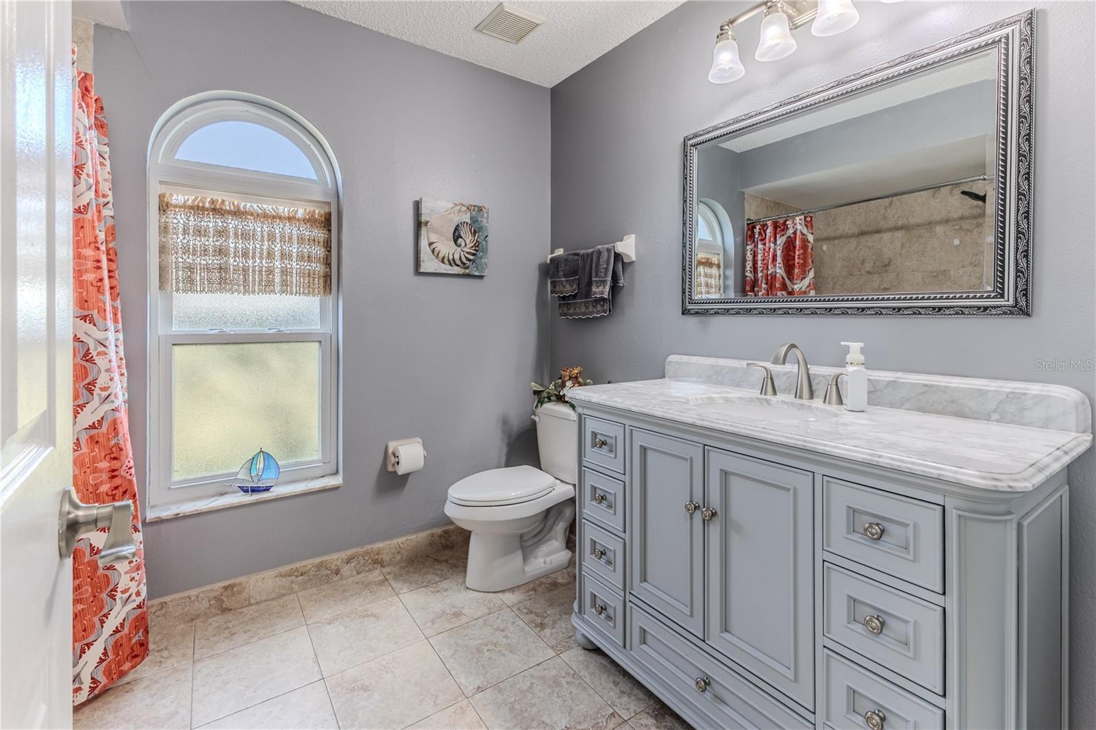 Gorgeous Vanity, notice the tile flooring and base