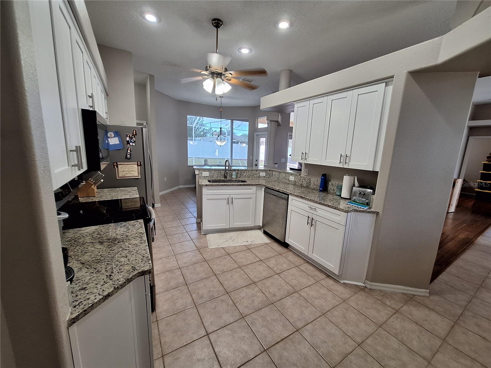 10ft - 14ft Ceilings Throughout.  Gourmet Kitchen