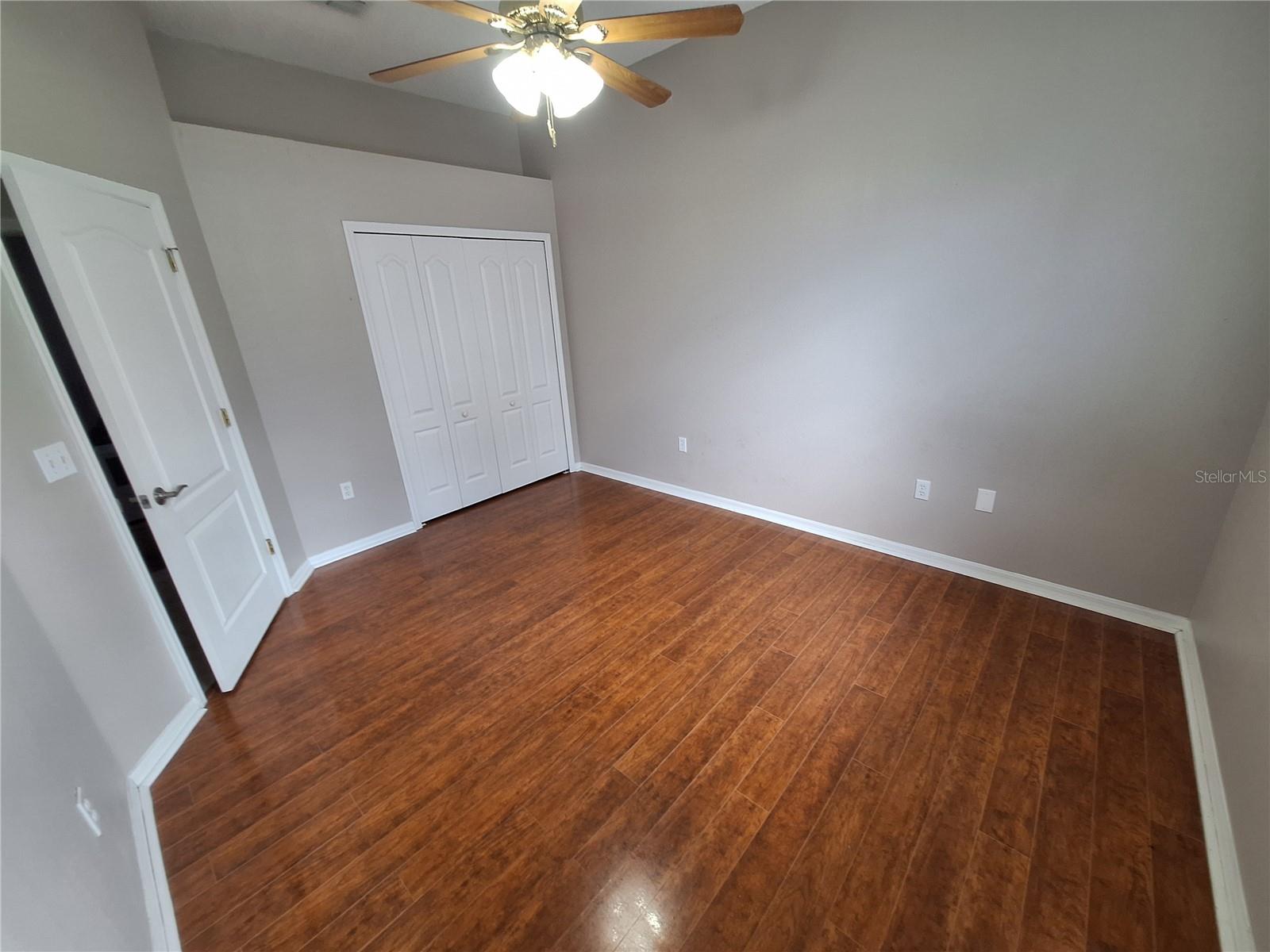 Spacious Room with Wood Laminate Floor