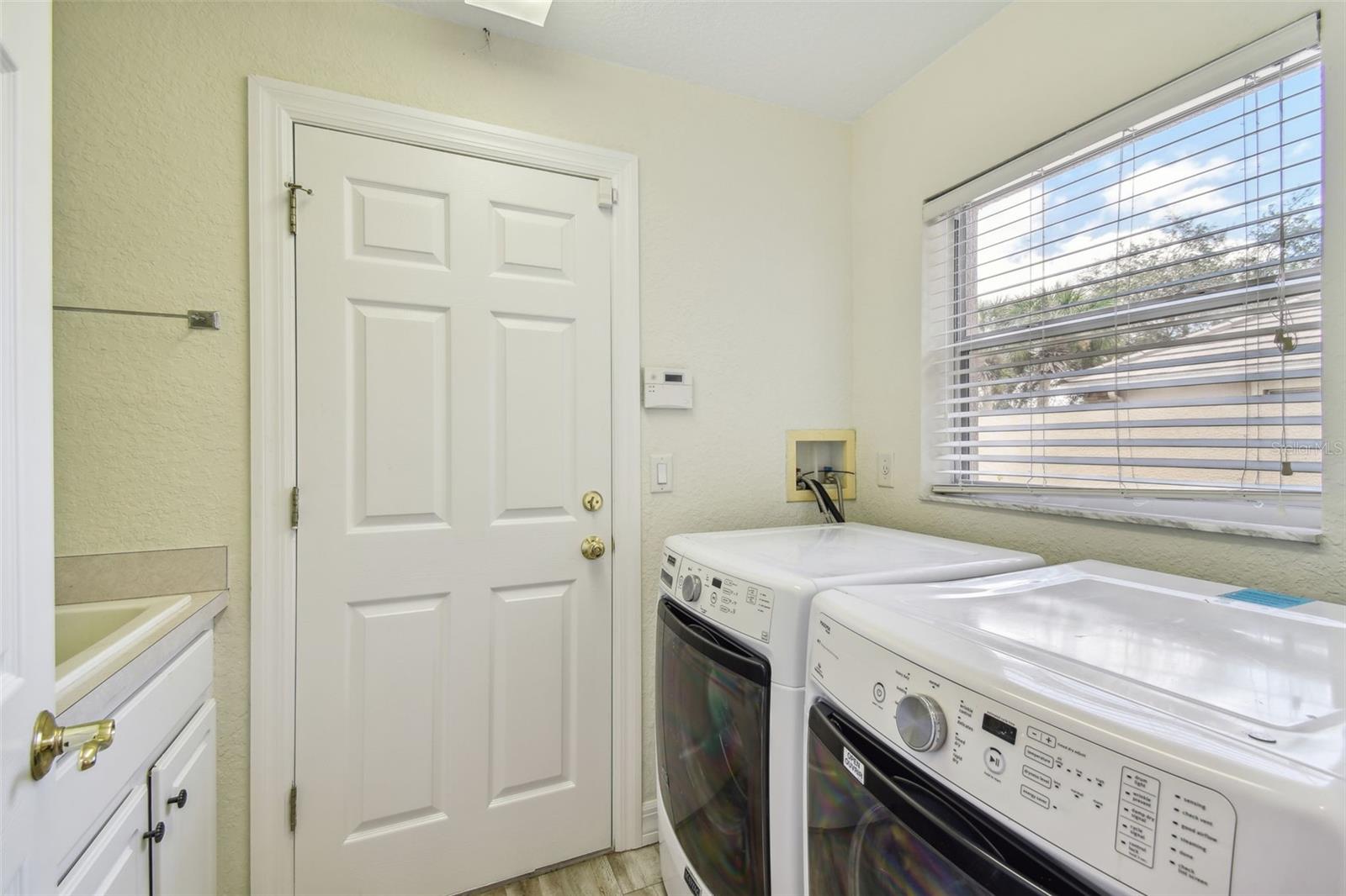 Inside laundry with laundry tub