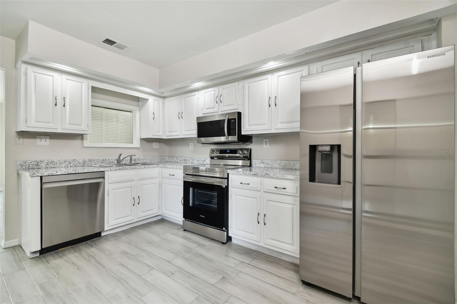 Kitchen with new appliances and a fresh look