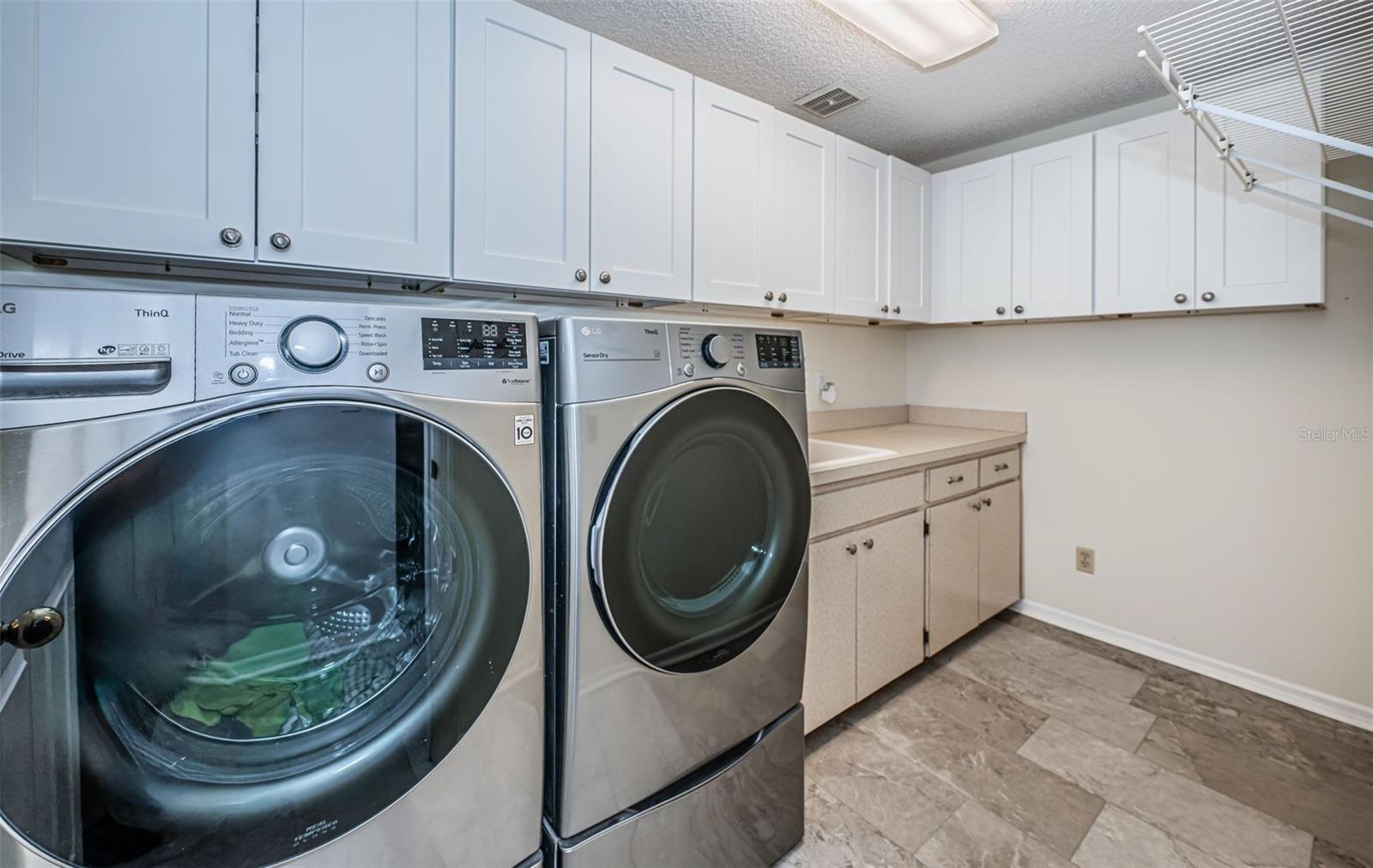 Laundry Room with Utility Sink and Storage